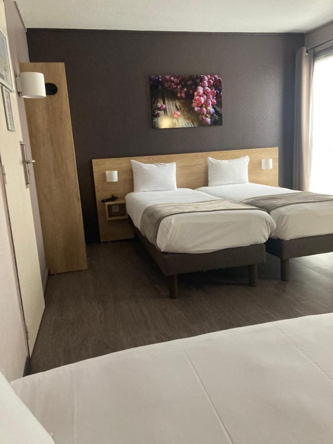 Hotel Wood Inn Bordeaux Aeroport เมรินแญค ภายนอก รูปภาพ